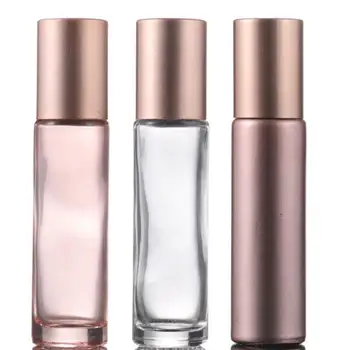 Етерично масло, 10 мл розов цвят стъклени бутилки с лъжичка-валяк от скъпоценни камъни и капачка от розово злато LX4002